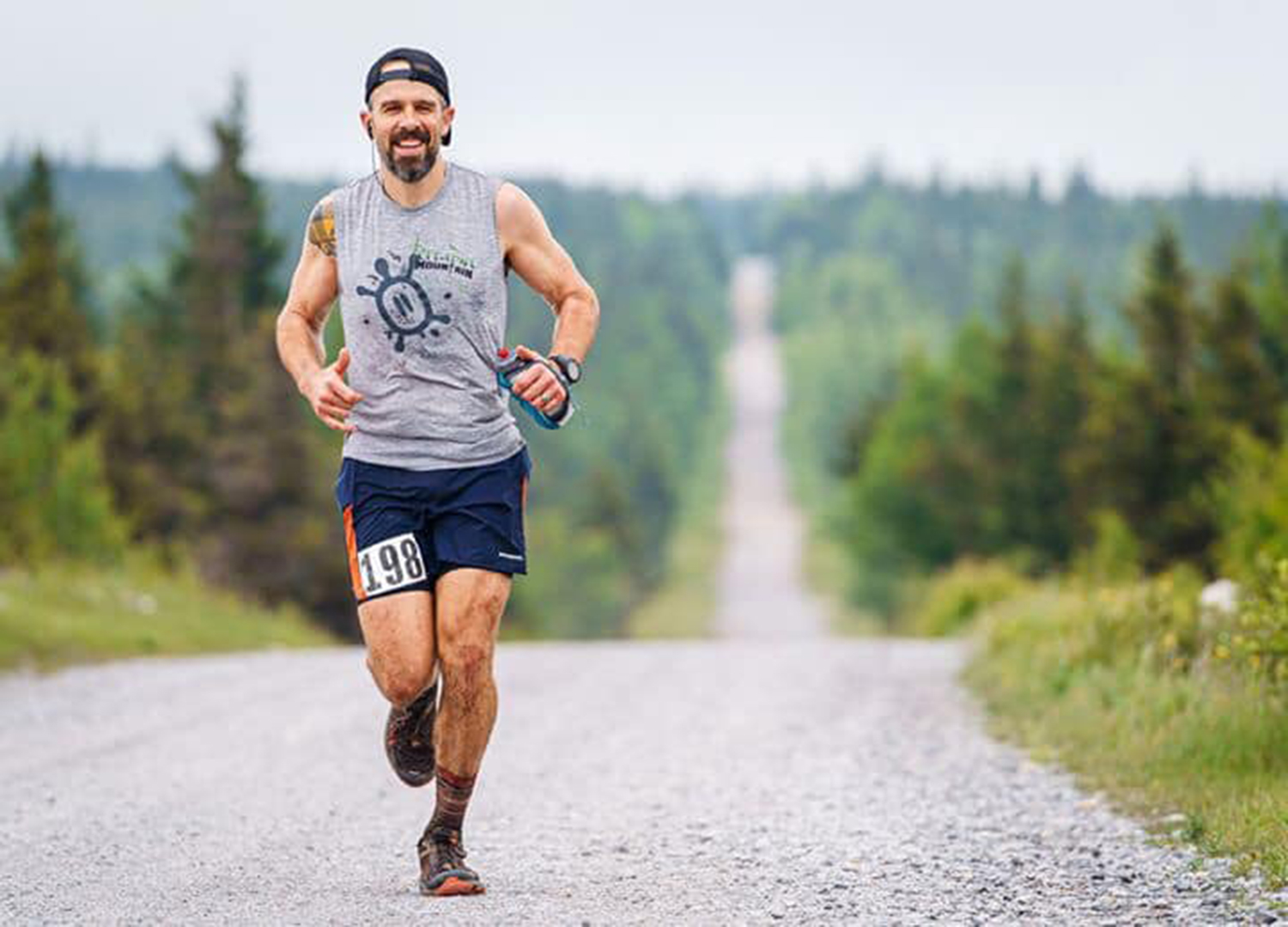 Richmond Sports Massage — Man running down country road